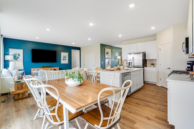 520 N Sycamore St, Hinckley, IL 60520 - dining room featuring light wood-type flooring and recessed lighting