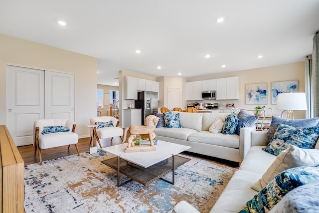 520 N Sycamore St, Hinckley, IL 60520 - living room featuring light wood finished floors and recessed lighting