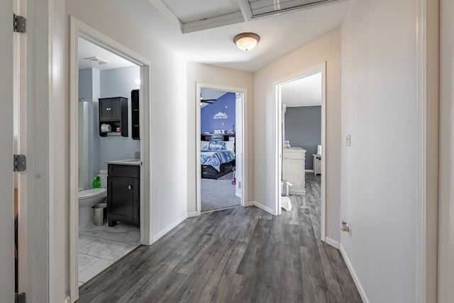 16263 Celtic Cir, Manhattan, IL 60442 - hallway featuring dark wood-type flooring and baseboards