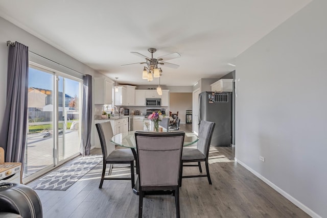 16263 Celtic Cir, Manhattan, IL 60442 - dining space featuring ceiling fan and wood finished floors