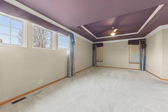 2811 Haven Ct, Naperville, IL 60564 - empty room featuring a raised ceiling, carpet flooring, a ceiling fan, and crown molding
