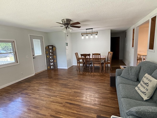 2705 Pine St, Rock Falls, IL 61071 - dining room featuring wood finished floors, a textured ceiling, and a ceiling fan