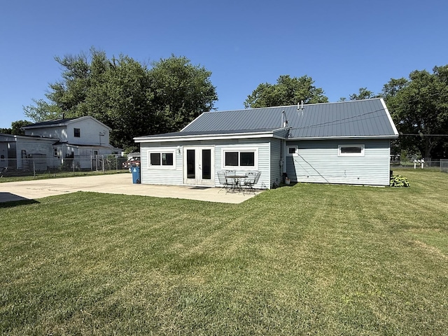 2705 Pine St, Rock Falls, IL 61071 - back of house with french doors, a patio, and a metal roof