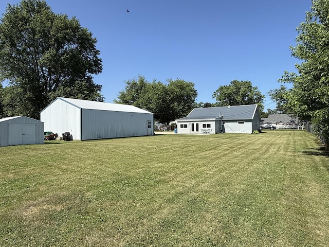 2705 Pine St, Rock Falls, IL 61071 - view of green lawn with an outdoor structure and an outbuilding