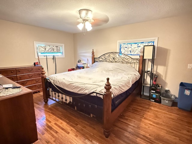 2705 Pine St, Rock Falls, IL 61071 - bedroom with wood finished floors, a textured ceiling, and ceiling fan