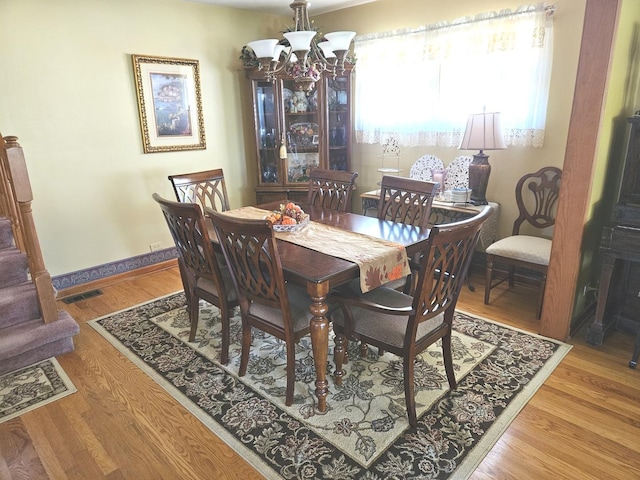 928 S Hillcrest Ave, Elmhurst, IL 60126 - dining room featuring a chandelier and wood finished floors
