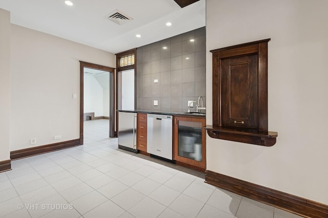 1120 Forest Ave, Evanston, IL 60202 - kitchen featuring dishwasher, refrigerator, dark countertops, recessed lighting, and tasteful backsplash