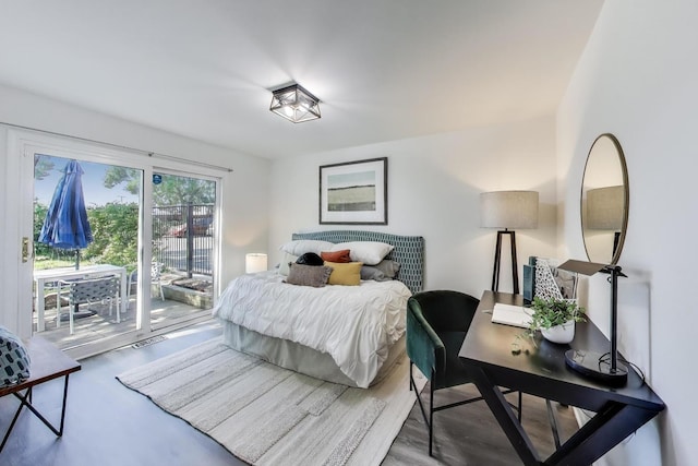 1728 W Terra Cotta Pl Unit D, Chicago, IL 60614 - bedroom with access to exterior, a desk, and wood finished floors