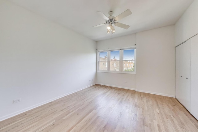1728 W Terra Cotta Pl Unit D, Chicago, IL 60614 - unfurnished bedroom with light wood finished floors, a closet, and ceiling fan