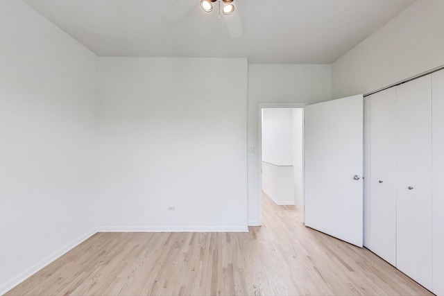 1728 W Terra Cotta Pl Unit D, Chicago, IL 60614 - unfurnished bedroom featuring light wood finished floors, a closet, and ceiling fan