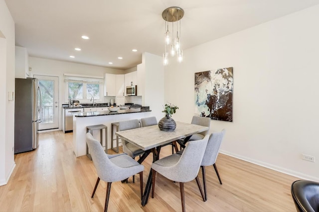 1728 W Terra Cotta Pl Unit D, Chicago, IL 60614 - dining space featuring light wood-type flooring and recessed lighting