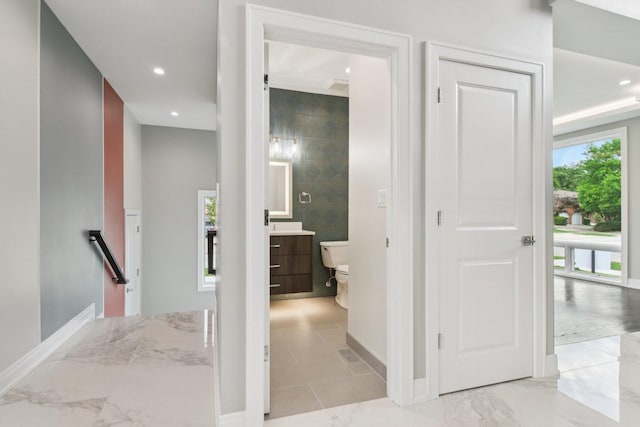 3933 Gloria Ct, Glenview, IL 60025 - hallway featuring an upstairs landing, marble finish flooring, and recessed lighting