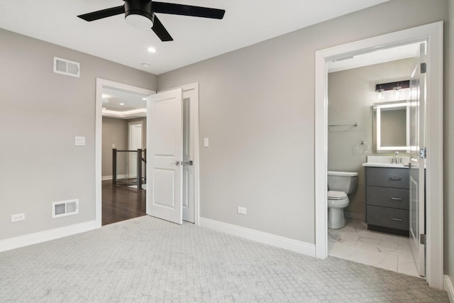 3933 Gloria Ct, Glenview, IL 60025 - unfurnished bedroom featuring recessed lighting, connected bathroom, light carpet, and a ceiling fan
