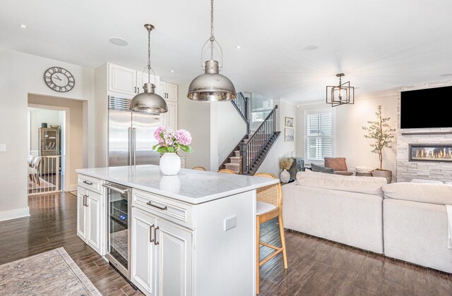 26 S Chestnut Ave, Arlington Heights, IL 60005 - kitchen featuring stainless steel built in fridge, open floor plan, wine cooler, dark wood-type flooring, and a kitchen breakfast bar