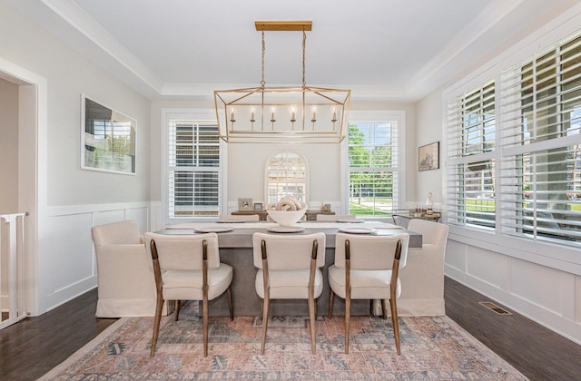 26 S Chestnut Ave, Arlington Heights, IL 60005 - dining space with a tray ceiling, wood finished floors, a decorative wall, wainscoting, and a chandelier