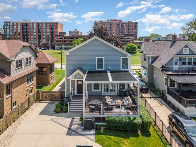 26 S Chestnut Ave, Arlington Heights, IL 60005 - view of front facade with a fenced backyard, a gate, and a view of city
