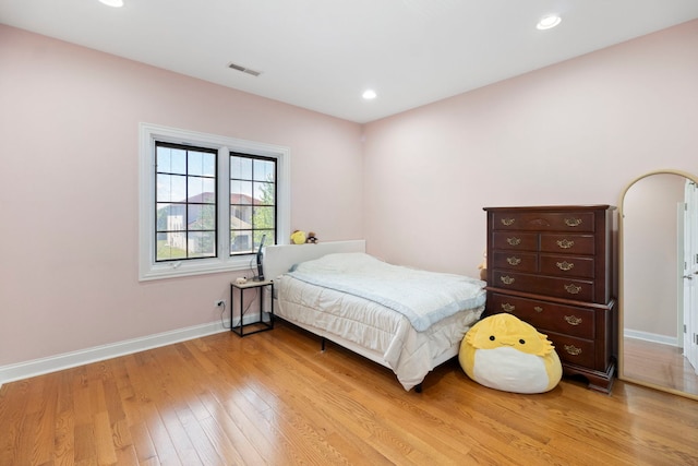 4146 Cardinal Ct, Northbrook, IL 60062 - bedroom with light wood-type flooring and recessed lighting
