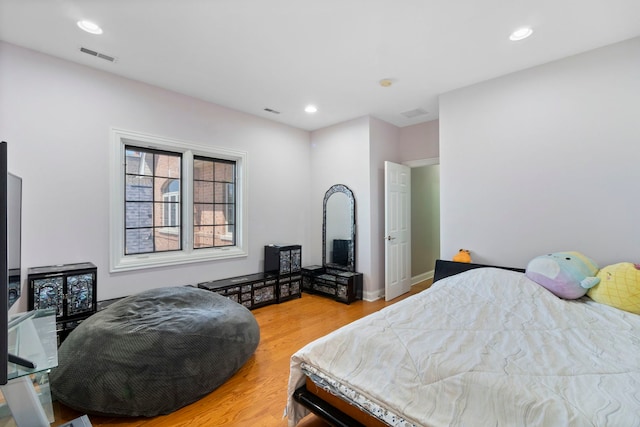 4146 Cardinal Ct, Northbrook, IL 60062 - bedroom with wood finished floors and recessed lighting