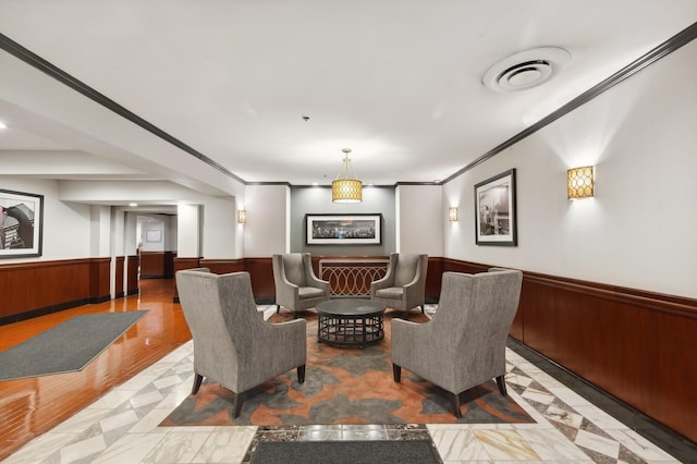 40 E 9th St Unit 802, Chicago, IL 60605 - common area featuring wainscoting, ornamental molding, and wood walls