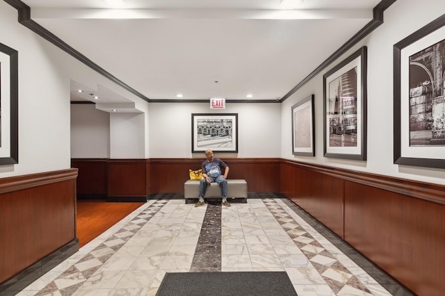 40 E 9th St Unit 802, Chicago, IL 60605 - community lobby featuring ornamental molding, a wainscoted wall, wooden walls, and recessed lighting