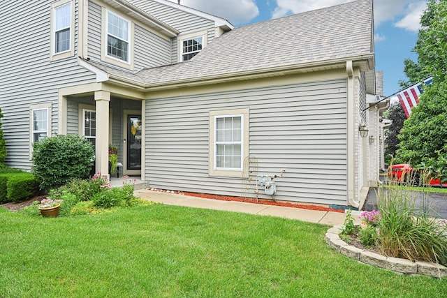 1021 Horizon Rdg, Lake In The Hills, IL 60156 - rear view of house featuring a lawn