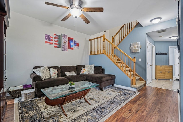 1021 Horizon Rdg, Lake In The Hills, IL 60156 - living room with ceiling fan, stairs, and wood finished floors