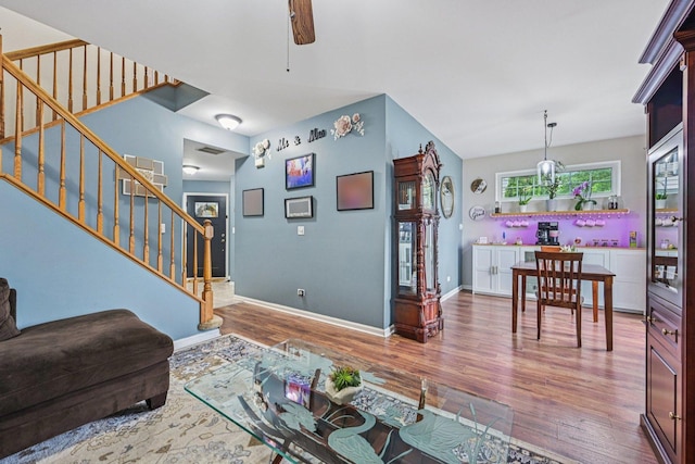 1021 Horizon Rdg, Lake In The Hills, IL 60156 - living room with stairway, wood finished floors, and ceiling fan