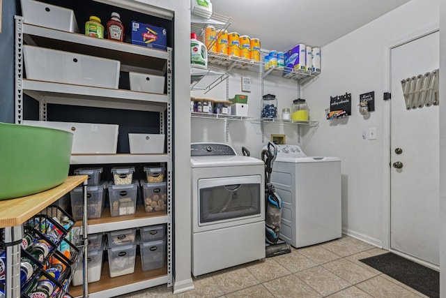1021 Horizon Rdg, Lake In The Hills, IL 60156 - laundry room with washer and clothes dryer and tile patterned floors
