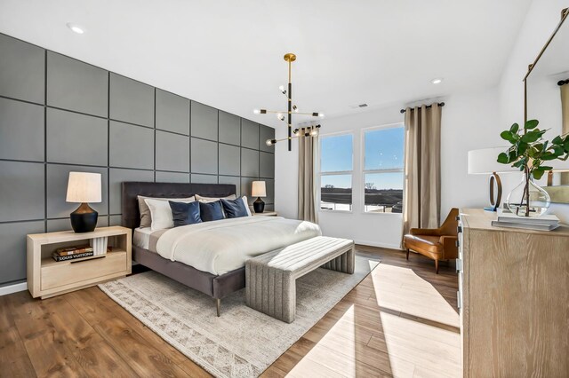 3238 Lincoln Prairie Blvd, Aurora, IL 60503 - bedroom featuring dark wood-style floors, recessed lighting, and a chandelier