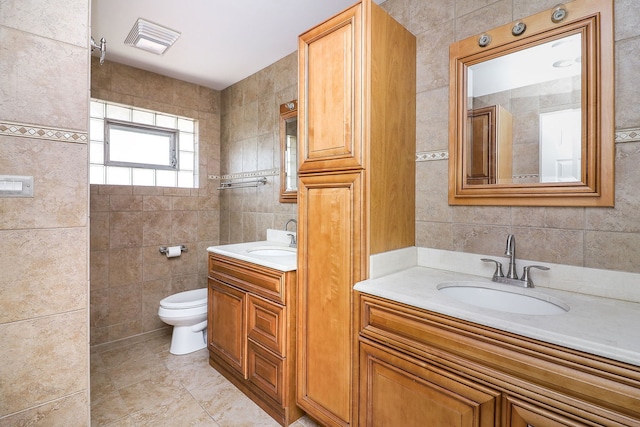 18W761 83rd St, Downers Grove, IL 60516 - bathroom featuring tile walls and vanity