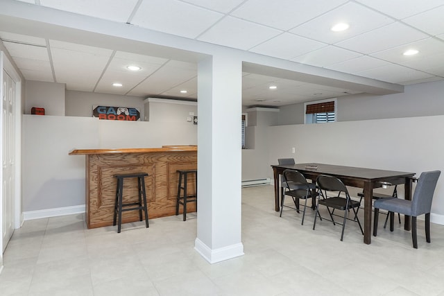 18W761 83rd St, Downers Grove, IL 60516 - dining space featuring a bar, a baseboard heating unit, recessed lighting, and a drop ceiling