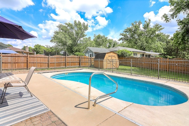 18W761 83rd St, Downers Grove, IL 60516 - view of pool with a patio area, a fenced backyard, and a shed