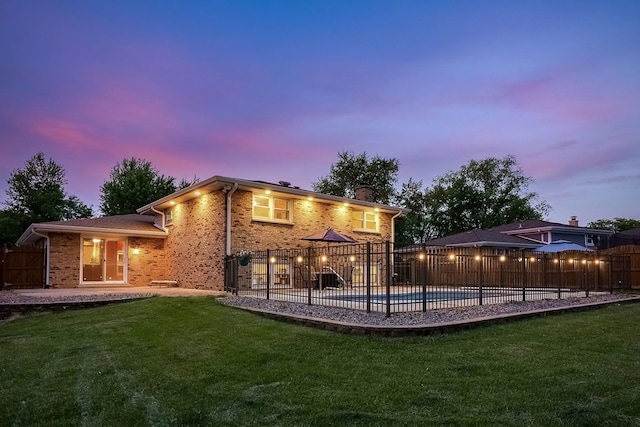 18W761 83rd St, Downers Grove, IL 60516 - back of house featuring brick siding, a patio, and a chimney