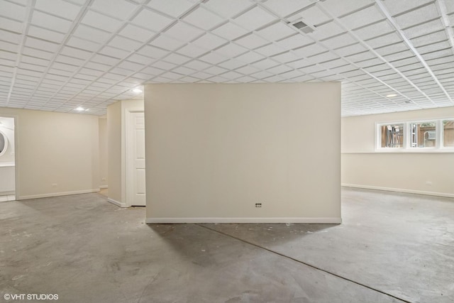 1580 W N St, Palatine, IL 60067 - below grade area featuring baseboards and stacked washing machine and dryer