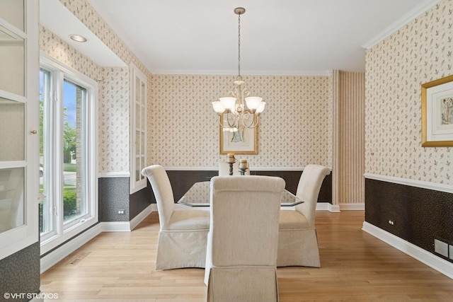 1580 W N St, Palatine, IL 60067 - dining area featuring wallpapered walls, a chandelier, wood finished floors, and crown molding