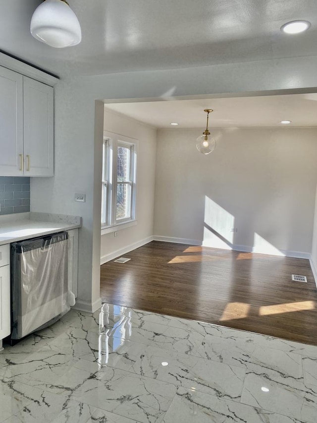 8416 S Bennett Ave, Chicago, IL 60617 - unfurnished living room featuring light wood-style flooring and recessed lighting