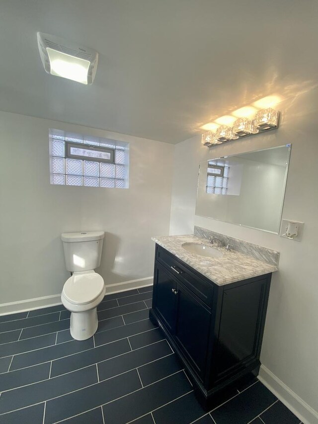8416 S Bennett Ave, Chicago, IL 60617 - half bath with vanity and tile patterned flooring