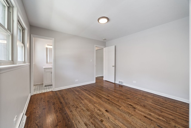 4850 N Clifton Ave, Norridge, IL 60706 - unfurnished room with dark wood-type flooring and baseboards