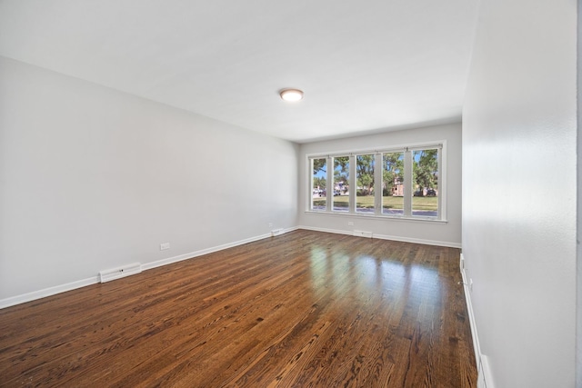 4850 N Clifton Ave, Norridge, IL 60706 - spare room with dark wood finished floors and baseboards