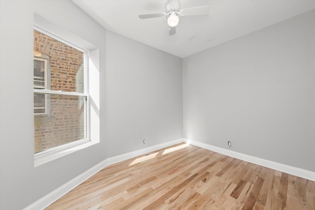 5726 S Elizabeth St, Chicago, IL 60636 - empty room featuring wood finished floors and a ceiling fan
