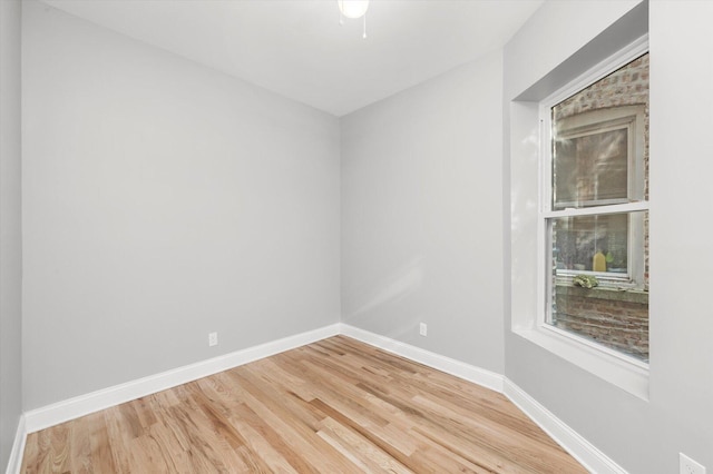 5726 S Elizabeth St, Chicago, IL 60636 - unfurnished room featuring wood finished floors and baseboards