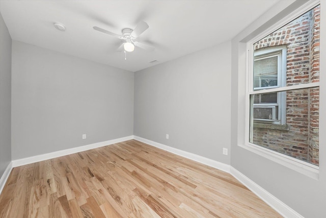 5726 S Elizabeth St, Chicago, IL 60636 - unfurnished room featuring light wood-style flooring, a ceiling fan, and a smoke detector