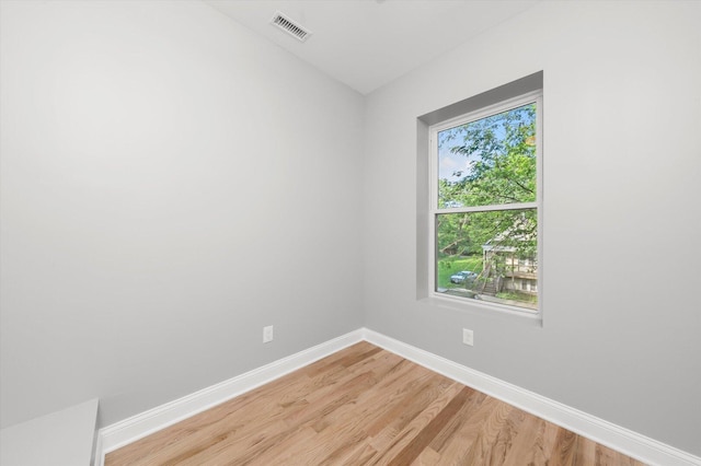 5726 S Elizabeth St, Chicago, IL 60636 - unfurnished room featuring baseboards and light wood finished floors