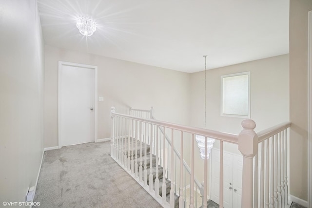 4045 N Harvard Ave, Arlington Heights, IL 60004 - hall featuring an upstairs landing, carpet flooring, and a chandelier