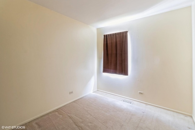 1335 Chelsea Cv, Roselle, IL 60172 - carpeted spare room with baseboards