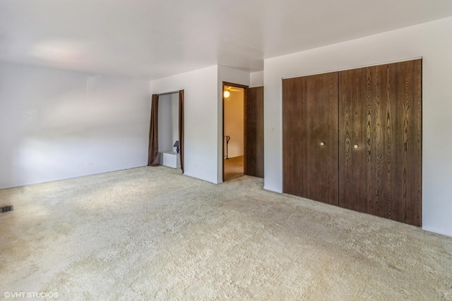 1335 Chelsea Cv, Roselle, IL 60172 - unfurnished bedroom featuring carpet and a closet
