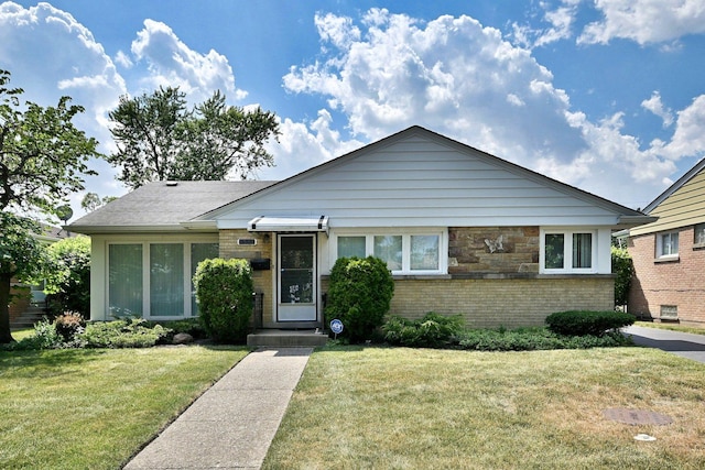 8532 N Olcott Ave, Niles, IL 60714 - view of front of house featuring a front lawn and brick siding
