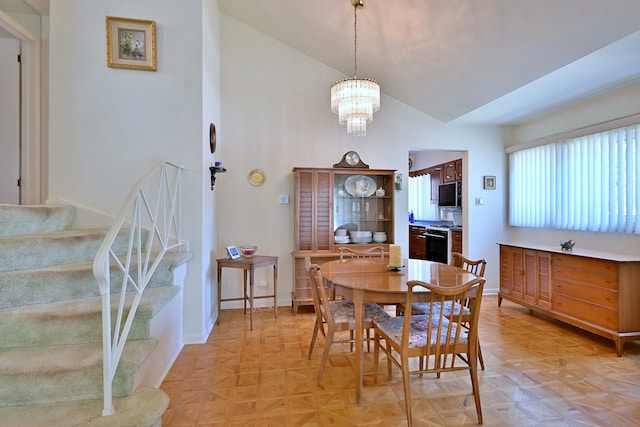 8532 N Olcott Ave, Niles, IL 60714 - dining area featuring stairs, high vaulted ceiling, and a chandelier