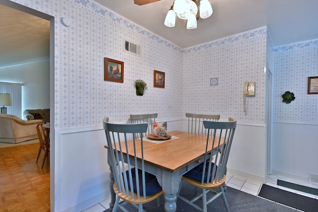8532 N Olcott Ave, Niles, IL 60714 - tiled dining room featuring a wainscoted wall