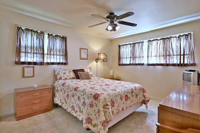 8532 N Olcott Ave, Niles, IL 60714 - bedroom with light colored carpet and ceiling fan
